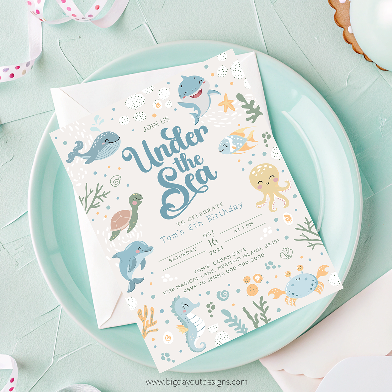 Under the Sea birthday party invitation on a light blue plate with ocean-themed illustrations.