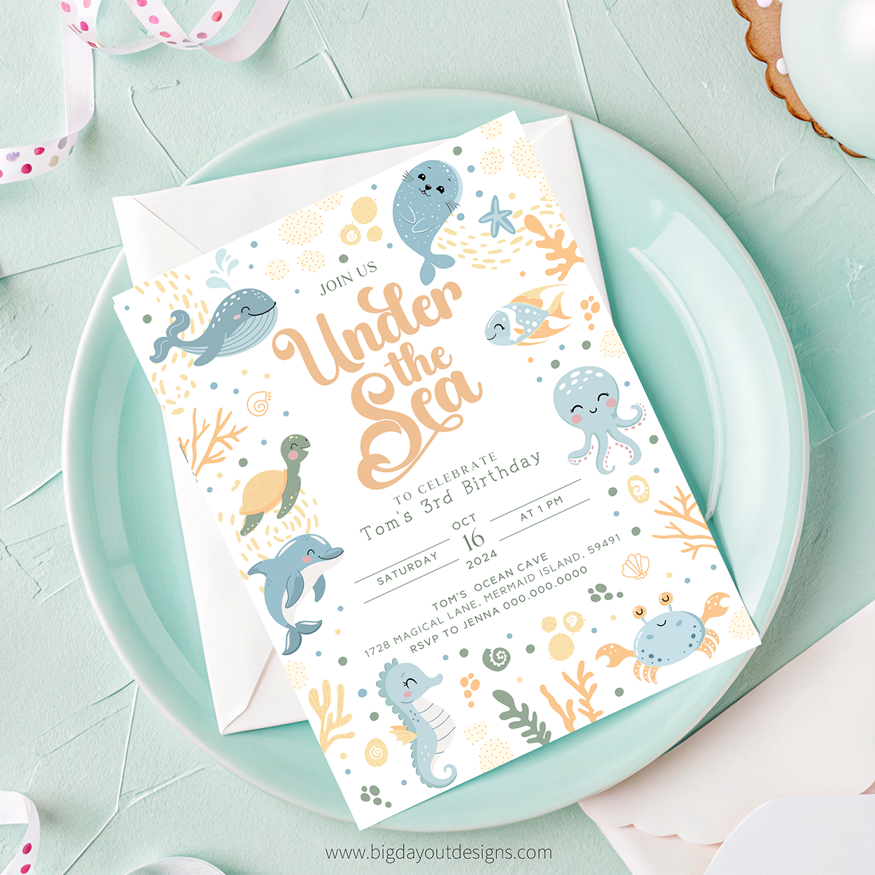 Under the Sea birthday party invitation on a light blue plate with decorative elements.