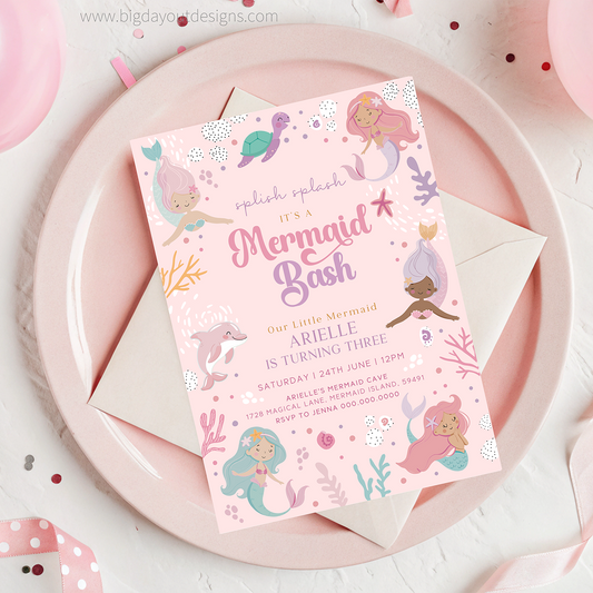 Mermaid-themed birthday party invitation on a pink plate with an envelope.