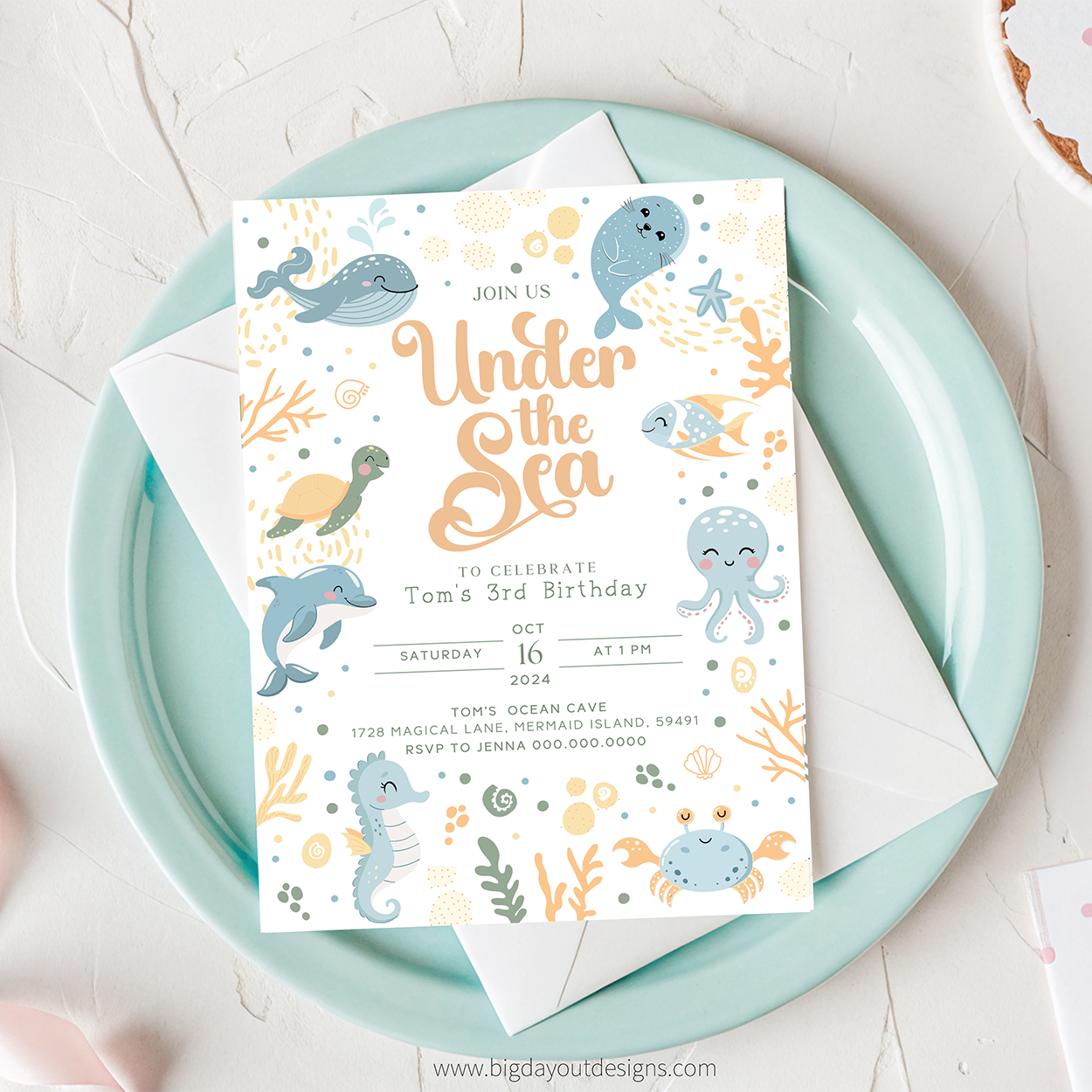 Under the Sea birthday invitation on a light blue plate with a white background