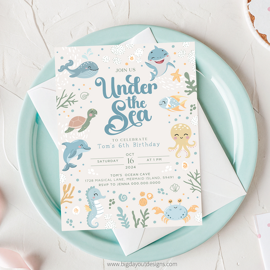 Under the Sea birthday invitation on a light blue plate with a white background