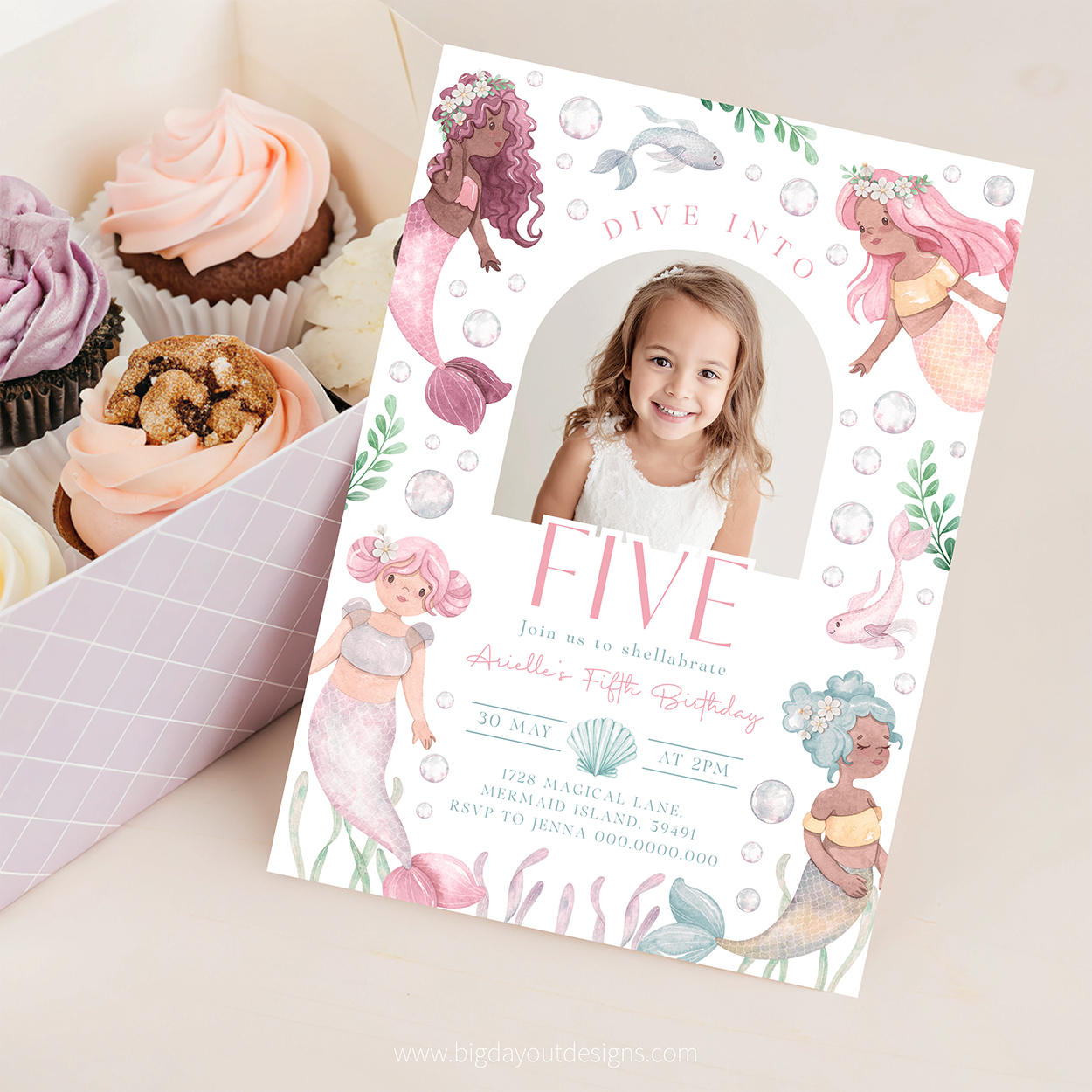 Mermaid-themed birthday invitation with a photo of a girl, surrounded by cupcakes.
