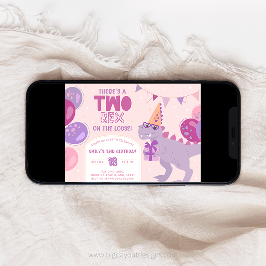 Phone displaying a birthday invitation with a dinosaur theme on a textured surface
