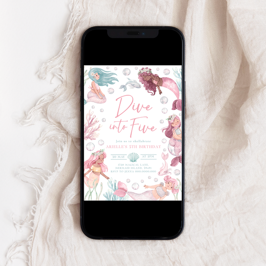 Phone displaying a mermaid-themed birthday invitation on a textured white surface