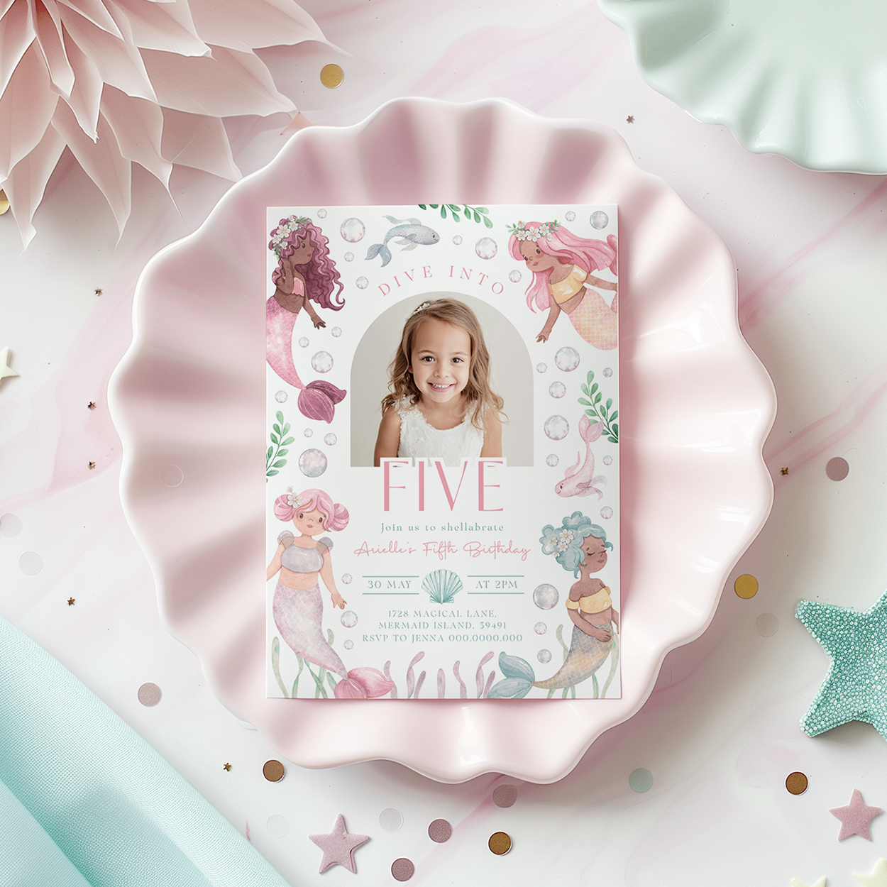 Invitation card with mermaid design on a decorative plate