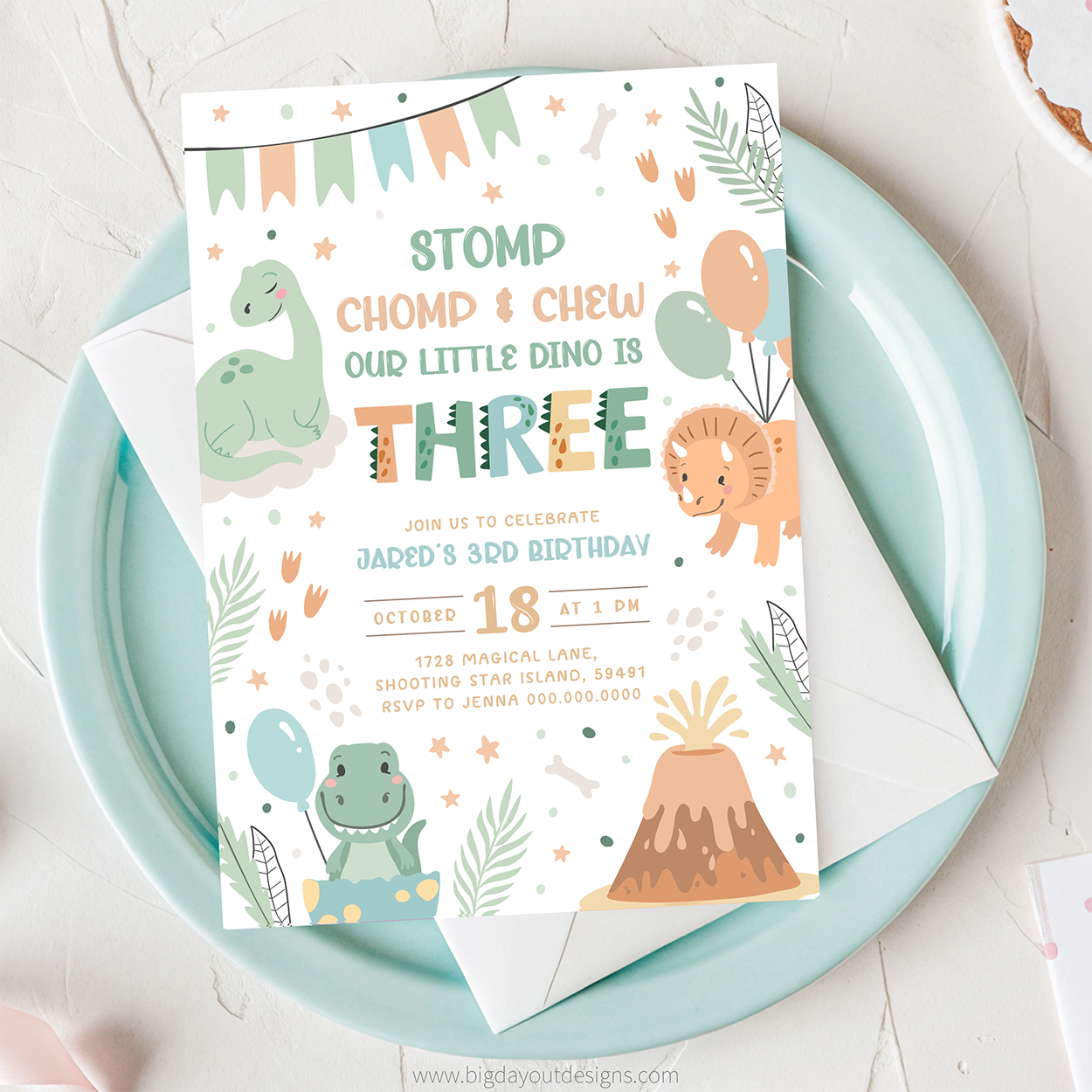 Children's birthday invitation card with dinosaur and lion graphics on a light blue plate.