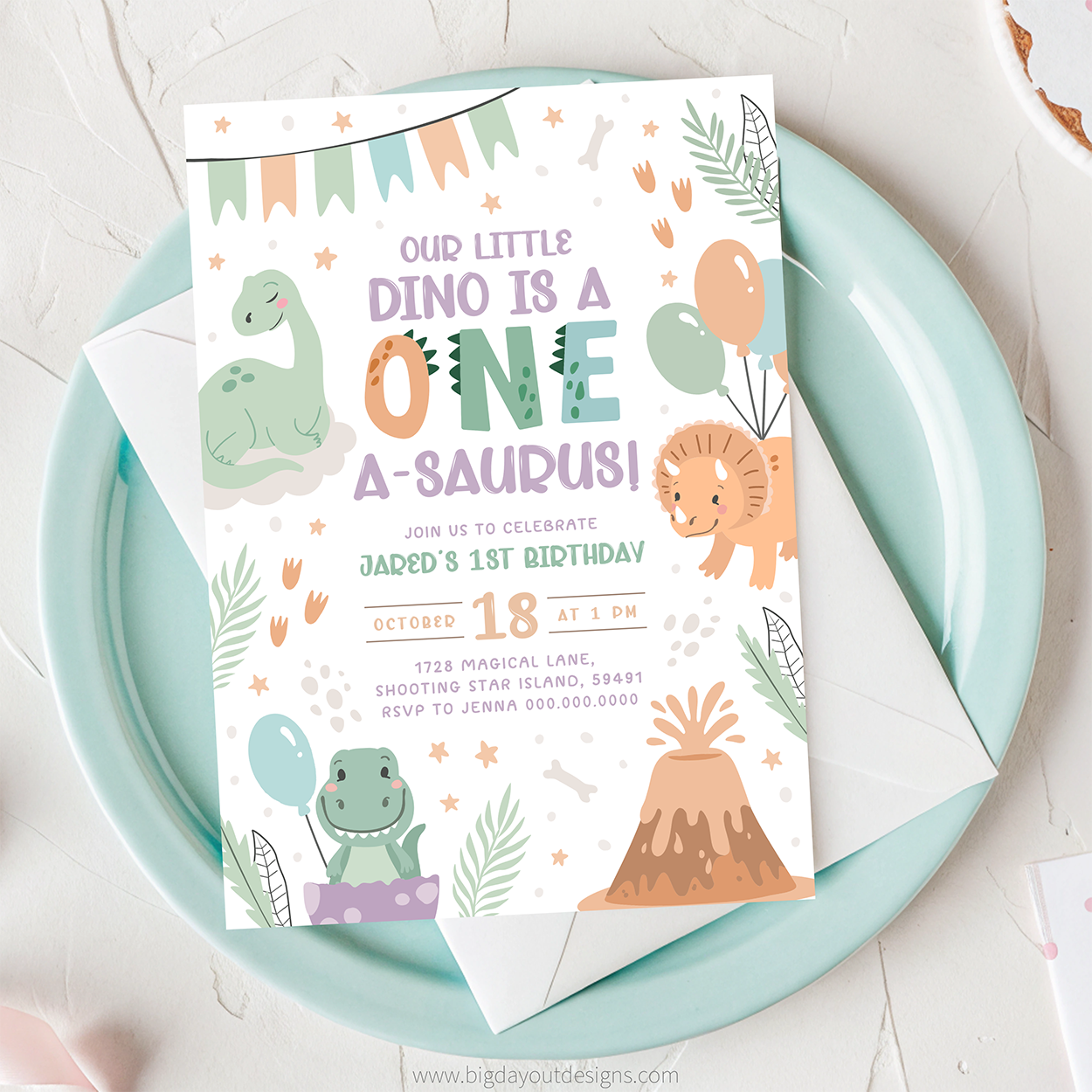 Dinosaur-themed birthday invitation card on a light blue plate with an envelope.