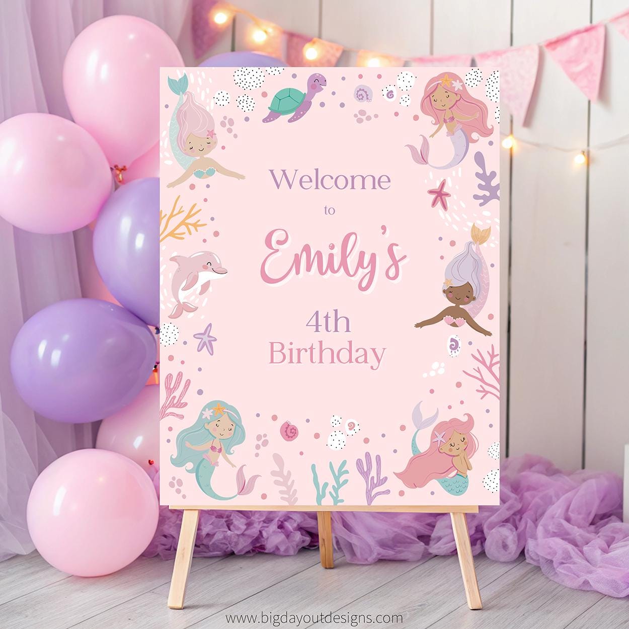 Birthday party sign with mermaid design and balloons in the background