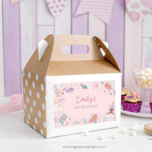 Gift box with personalized design for a birthday party, featuring polka dots and a mermaid theme.