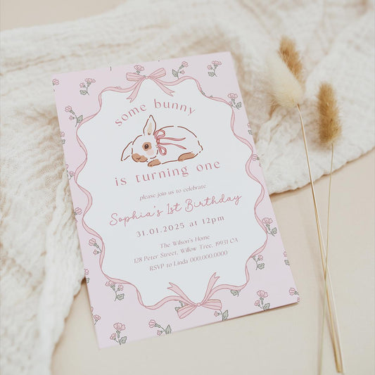 Vintage bunny first birthday invite with pink bow design