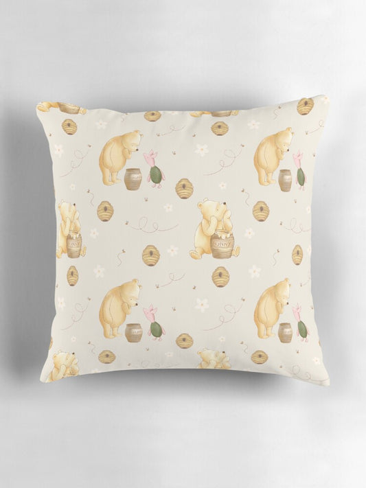 Decorative pillow with winnie the pooh bear pattern on a light gray background