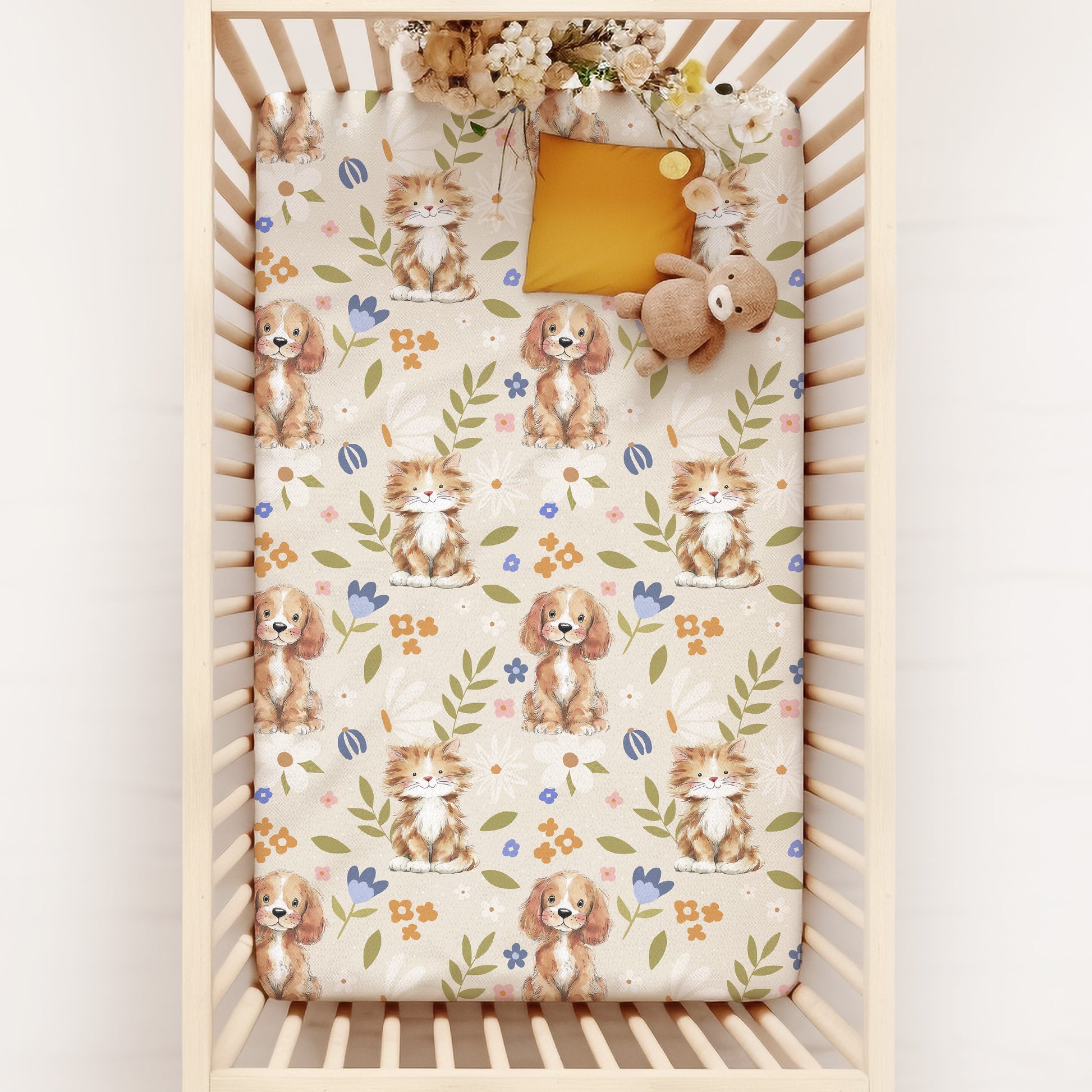 Crib with a floral dog and cat patterned crib sheets