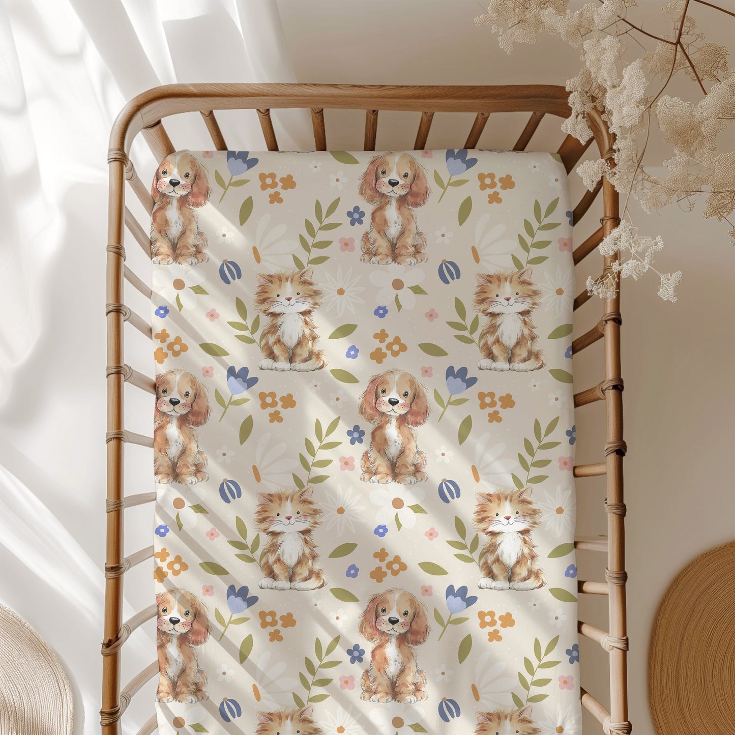 Crib sheet with puppy and kitten pattern on a wooden crib