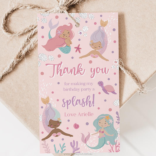 Pink 'Thank you' card with mermaid illustrations on a beige background