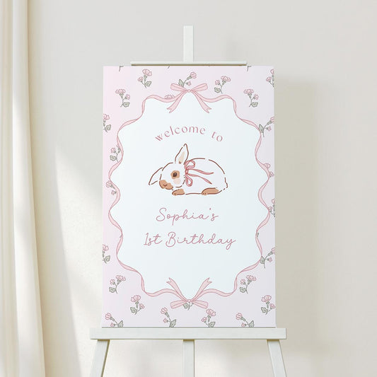 Some Bunny is Turning One pink bow welcome sign