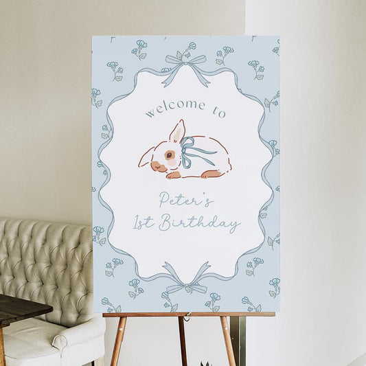 Some Bunny is Turning One blue bow welcome sign

