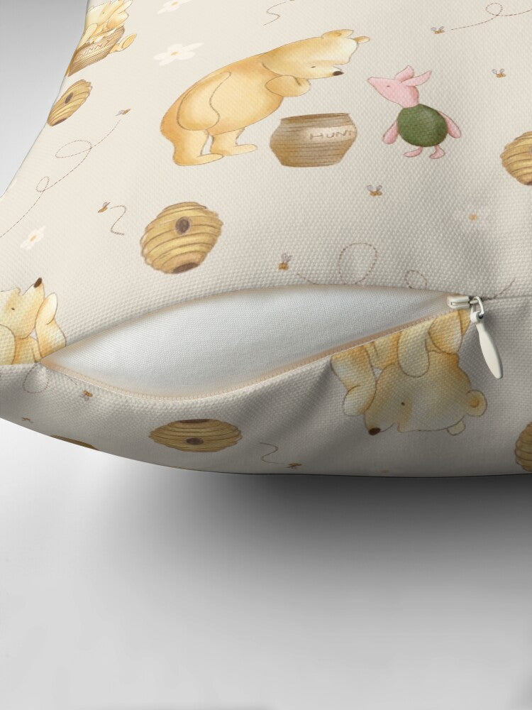 Children's pillow with pooh bear pattern on a plain background