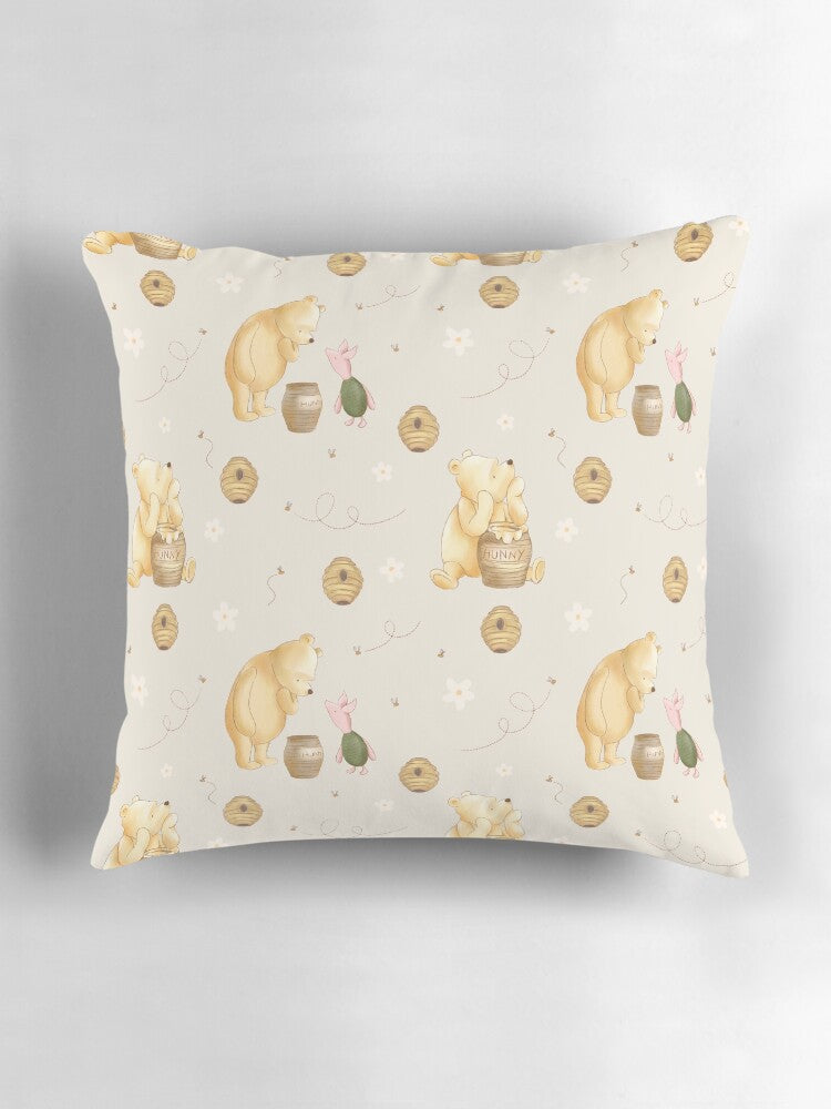 Decorative pillow with winnie the pooh bear pattern on a light gray background
